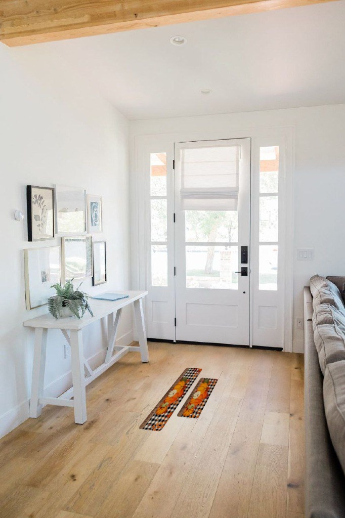 Fall rug ideas in White Scandinavian Entryway
