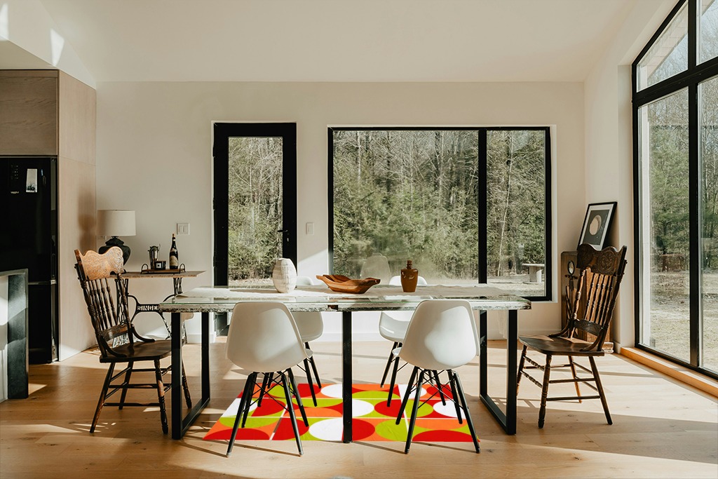 Dining table rug ideas in Modern Scandinavian Dining Room with Black Accents