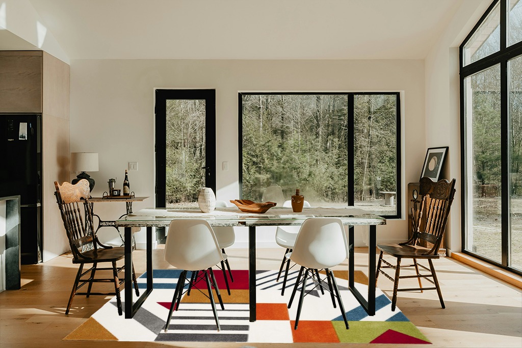 Dining table rug ideas in Modern Scandinavian Dining Room with Black Accents