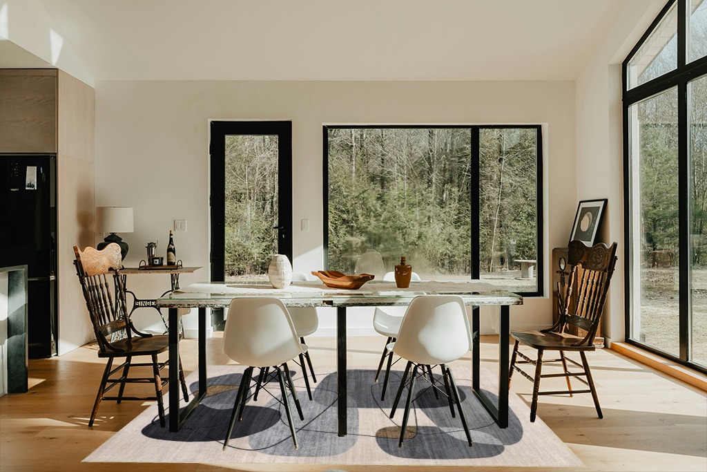 Dining table rug ideas in Modern Scandinavian Dining Room with Black Accents