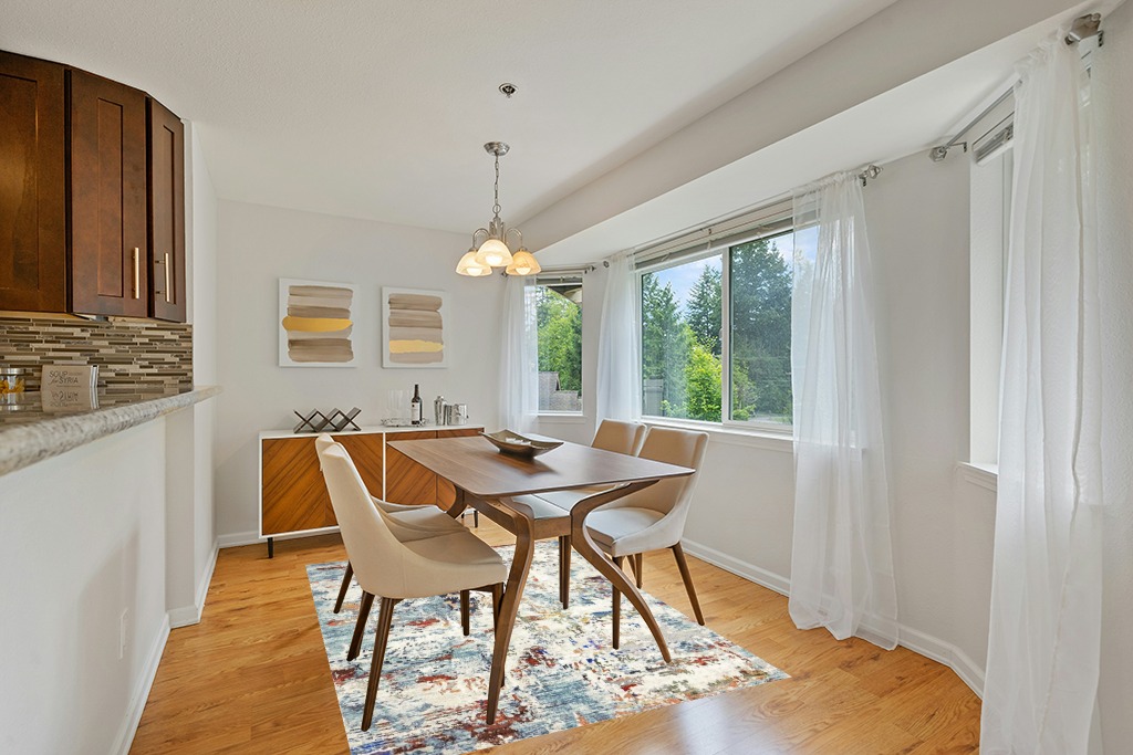 Dining table rug ideas in Modern White Dining Room with Wooden Accents