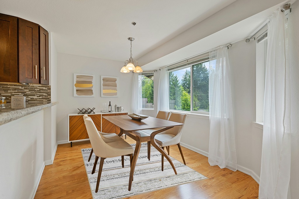 Dining table rug ideas in Modern White Dining Room with Wooden Accents