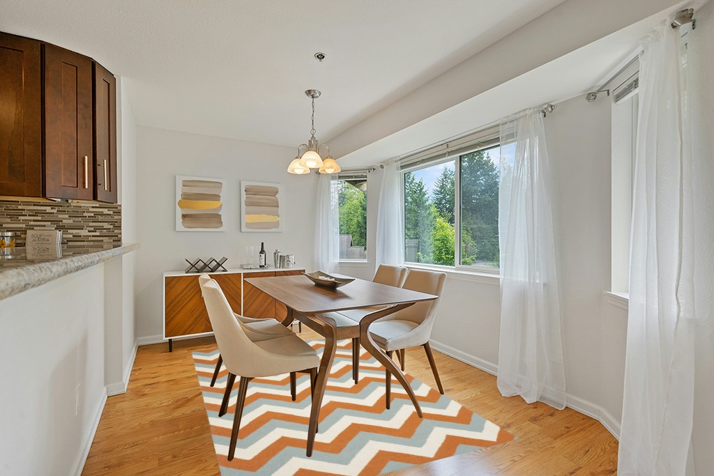 Dining room rug ideas in Modern White Dining Room with Wooden Accents