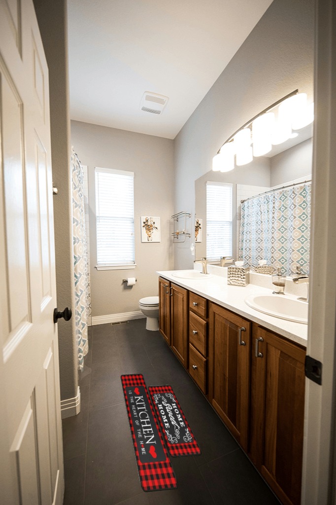 Are black rugs a bad idea in Wooden and Grey Bathroom