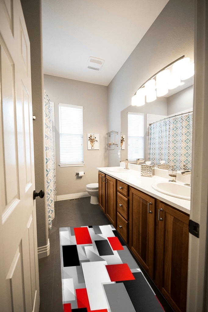 Are black rugs a bad idea in Wooden and Grey Bathroom