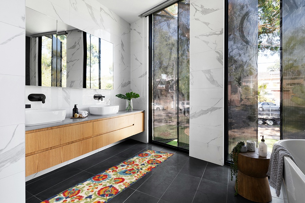 Blue rug ideas in Modern Black Tiled bathroom