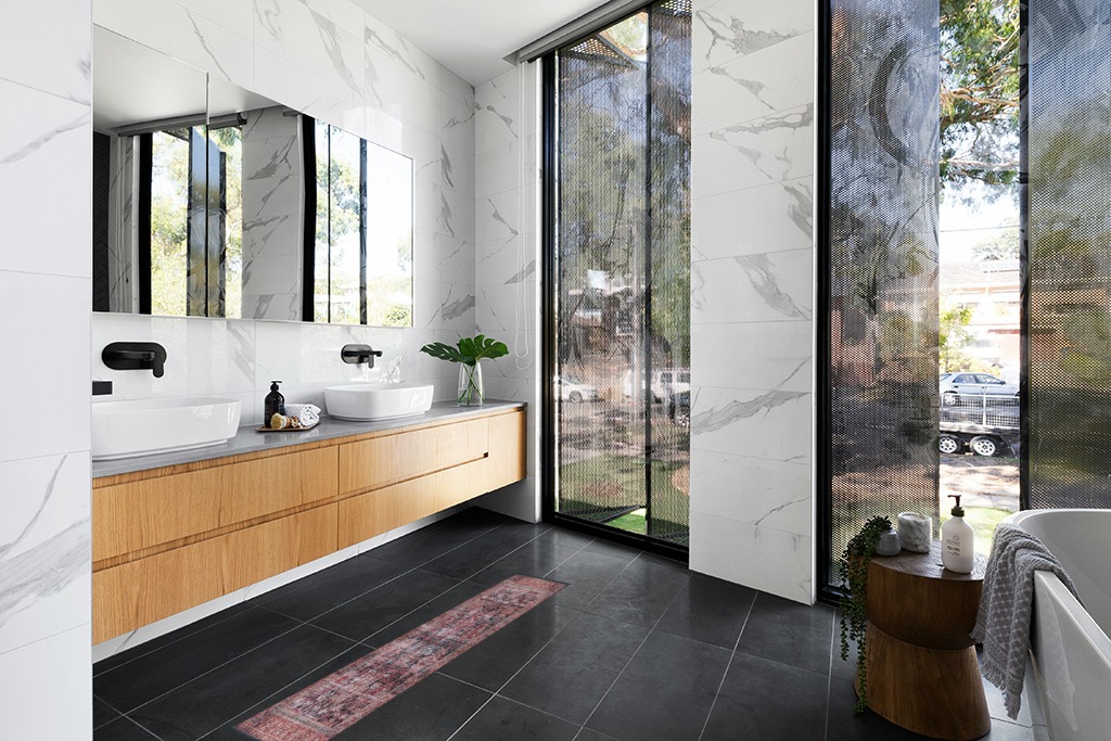 Are black rugs a bad idea in Modern Black Tiled bathroom