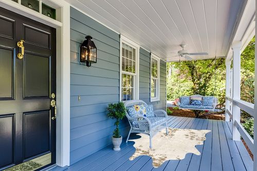 nuLOOM Marcia Machine Washable Faux Cowhide Area Rug, 5' x 6' 7", Off-White in Light Blue Patio