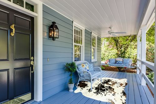 HIDES BAZAAR Light Tricolor Cowhide Rug, Premium Quality Genuine Leather Cow Hide, White, Brown and Black Color Mix Area Rug (5x7 ft) in Light Blue Patio