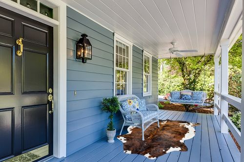 HIDES BAZAAR Brown Brindle Cowhide Rug, Premium Quality Genuine Leather Cow Hide, Brown, Black and White Area Rug (5x7 ft) in Light Blue Patio