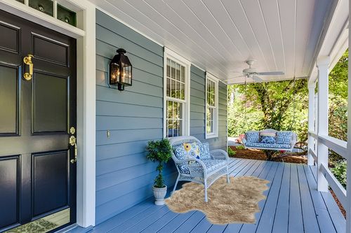 Nouvelle Legende® Faux Fur Sheepskin Premium Rug Quattro (43 in. X 73 in.) Tan in Light Blue Patio