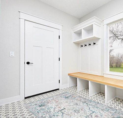 Traditional Persian Rug with Rubber Backing in White Modern Entryway