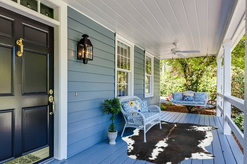 HIDES BAZAAR Dark Brindle Cowhide Rug, Premium Quality Genuine Leather Cow Hide, Dark Brown, Black and White Area Rug (6x7 ft) in Light Blue Patio