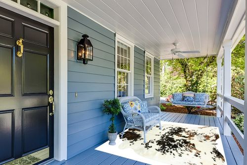 HIDES BAZAAR Light Tricolor Cowhide Rug, Premium Quality Genuine Leather Cow Hide, White, Brown and Black Color Mix Area Rug (6x7 ft) in Light Blue Patio