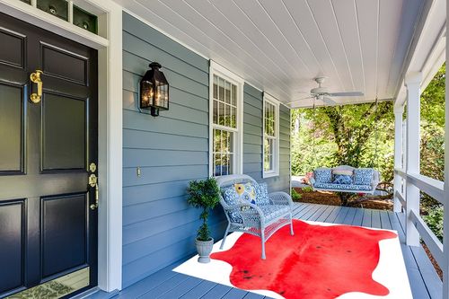 Appaloosa Cowhides Color Dyed Collection (Rusty Red) in Light Blue Patio