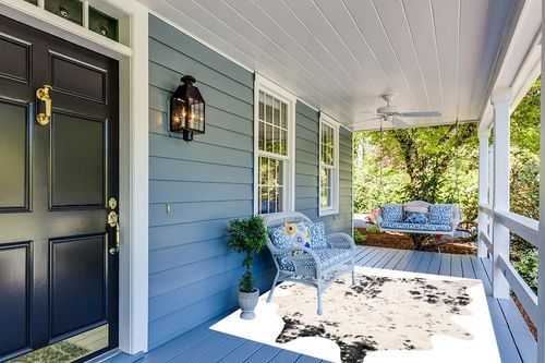 nuLOOM Iraida Contemporary Faux Cowhide Area Rug, 5' x 6' 7", Black in Light Blue Patio