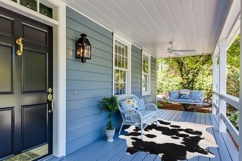 Home Must Haves Cowhide Rug, 6' x 7', Black and White in Light Blue Patio