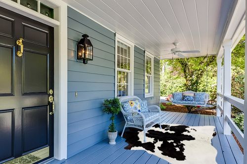 Cowhides Direct Genuine Cowhide Rug - Black & White Rug for Living Room, Bedroom & More - Authentic Cow Rug (6’x7’ Black & White) in Light Blue Patio