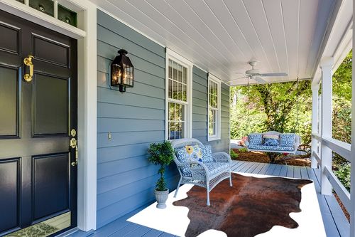 Genuine Brindle Dark Reddish Cowhide Rug XL Size 6 x 7-8 ft. 180 x 240 cm in Light Blue Patio