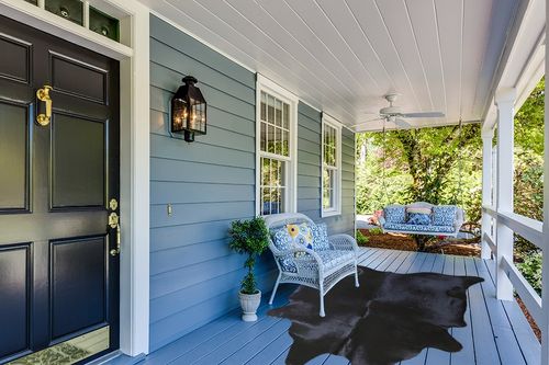 Sunshine Cowhides Genuine Black Cowhide Rug - Luxurious Cow Rug for Bedroom, Living Room, and Home Decor Enthusiasts - Masterpiece of Style and Functionality - XL 6x7-8ft (180x220cm) in Light Blue Patio