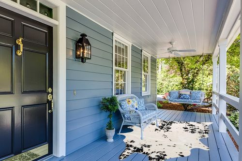 nuLOOM Marcia Machine Washable Faux Cowhide Area Rug, 5' 9" x 7' 7", Black in Light Blue Patio