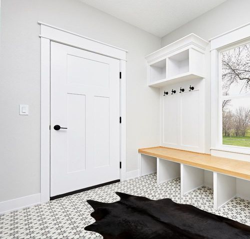 rodeo Solid Black Cowhide Rug (5x7) in White Modern Entryway