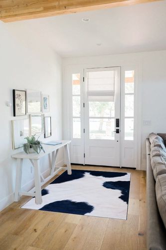 Safavieh Faux Hide Collection Accent Rug - 4' x 6', Ivory & Dark Blue, Non-Shedding & Easy Care, Machine Washable Ideal for High Traffic Areas in Entryway, Living Room, Bedroom (FAH548A) in White Scandinavian Entryway