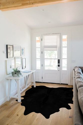 Faux Fur Cowhide Rugs (5 * 7 ft), Machine Washable Cow Print Area Carpet Black Color with Non-Slip Suede Backing, Durable & No Shedding in White Scandinavian Entryway