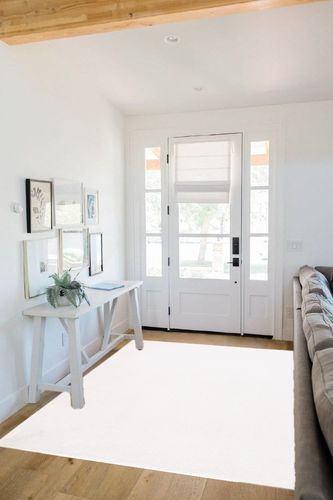 SAFAVIEH Faux Rabbit Fur Collection Area Rug - 5' x 7', Off White, Solid Design, Non-Shedding Machine Washable & Slip Resistant Ideal for High Traffic Areas in Living Room, Bedroom (FRF500A) in White Scandinavian Entryway