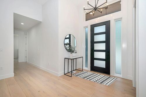 Lahome Boho Geometric Washable Area Rug in Modern White Entryway