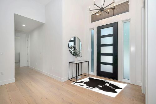 MACEVIA Faux Cowhide Rug Cute Cow Print Rug Animal Area Carpet Western Decor for Living Room Bedroom Non-Slip 59" L x 47.2" W(4.9ft x 3.9ft) Black and White in Modern White Entryway