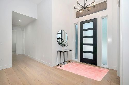GHOUSE Light Pink 4 ft. x 6 ft. Silky Faux Fur Sheepskin Shag Fluffy Fuzzy Area Rug in Modern White Entryway