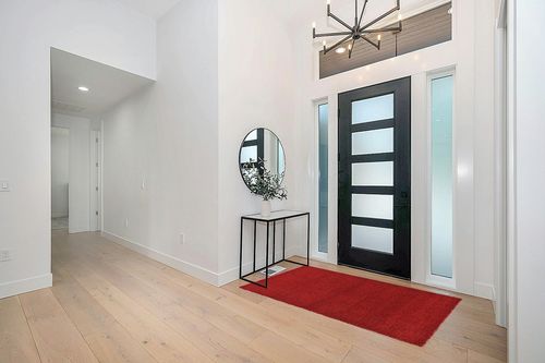 Unique Loom Solid Shag Collection Area Rug (4' 1" x 6' 1" Rectangle, Cherry Red) in Modern White Entryway