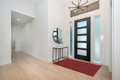 Garland Rug Sparta 4 ft. x 6 ft. Area Rug Chili Red in Modern White Entryway