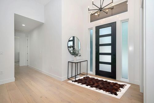 SAFAVIEH Studio Leather Collection 4' x 6' Ivory / Brown STL806A Handmade Mid-Century Modern Leather Area Rug in Modern White Entryway