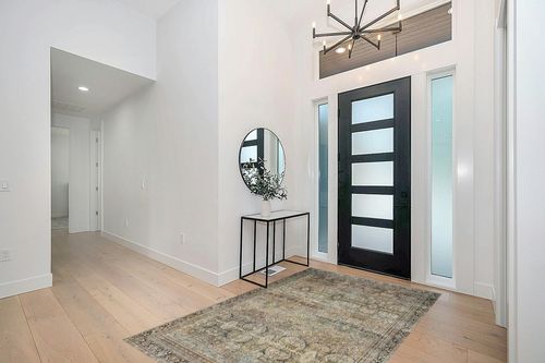 Loloi II Layla Collection LAY-03 Traditional Olive/Charcoal 5'-0" x 7'-6" Area Rug in Modern White Entryway