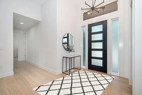 Marrone Geometric Ivory/Black Area Rug George Oliver Rug Size: Rectangle 5'1" x 7'6" in Modern White Entryway