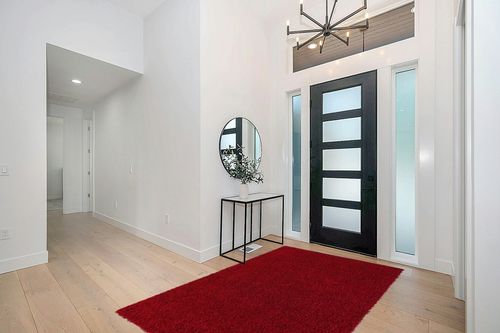 Unique Loom Solid Shag Collection Area Rug (5' 3" x 8' Rectangle, Cherry Red) in Modern White Entryway