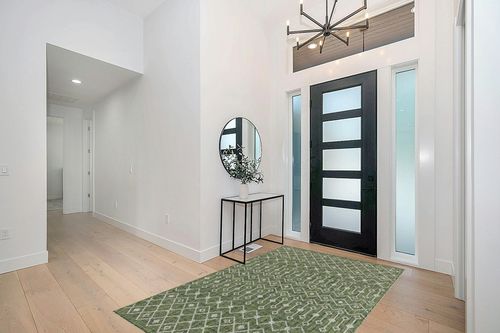 Unique Loom Outdoor Trellis Collection Area Rug - Tribal Trellis (5' 1" x 8' Rectangle, Green/ Natural) in Modern White Entryway
