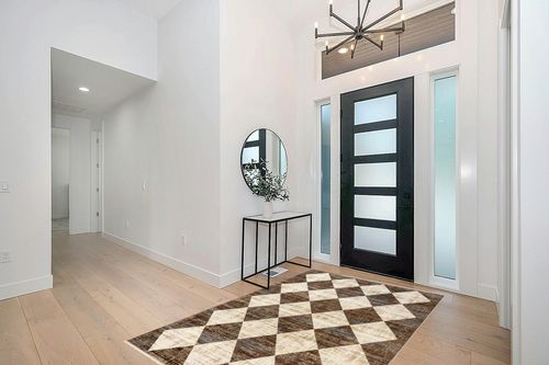 nuLOOM Meline Checkered Fringe Area Rug, 5x8, Beige in Modern White Entryway