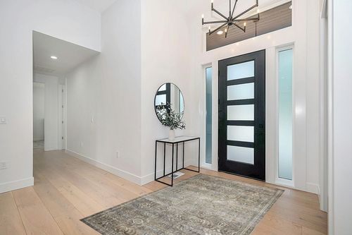 Loloi II Layla Collection LAY-13 Antique/Moss, Traditional 5'-0" x 7'-6" Area Rug in Modern White Entryway