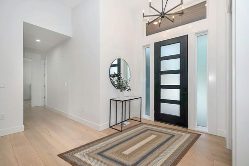 SAFAVIEH Braided Collection Area Rug - 5' x 8', Brown & Multi, Handmade Country Cottage Reversible, Ideal for High Traffic Areas in Living Room, Bedroom (BRD313A) in Modern White Entryway