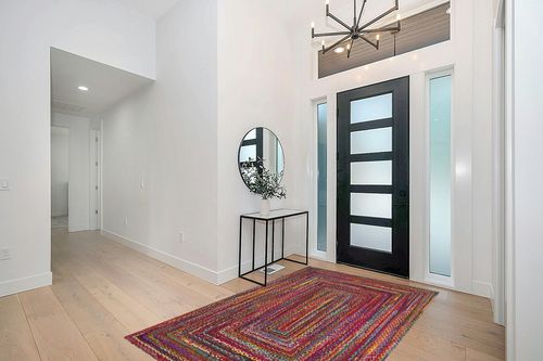 SAFAVIEH Braided Collection Area Rug - 5' x 8', Red & Multi, Handmade Boho Reversible Cotton, Ideal for High Traffic Areas in Living Room, Bedroom (BRD210A) in Modern White Entryway