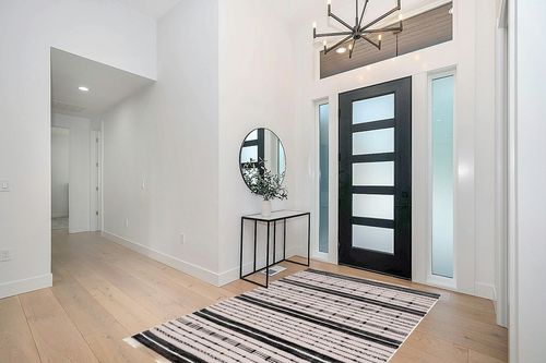 Safavieh Striped Kilim Collection Area Rug - 5' x 8', Beige & Black, Flat Weave Boho Tassel Fringe Cotton Design, Easy Care, Ideal for High Traffic Areas in Living Room, Bedroom (STK206B) in Modern White Entryway