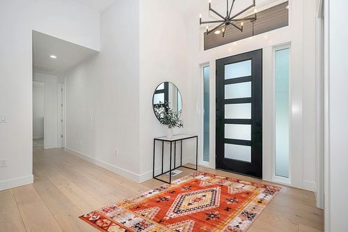 nuLOOM Reda Aztec Bordered Machine Washable Ultra Thin Area Rug, 5' x 8', Burnt Orange in Modern White Entryway
