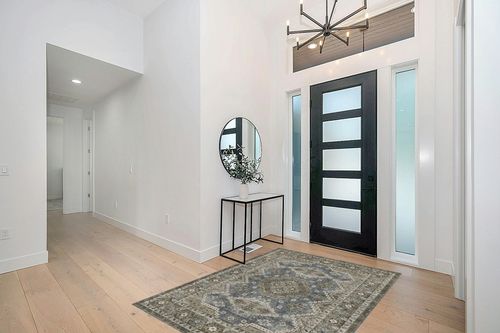 Stain Resistant Washable Rug in Modern White Entryway