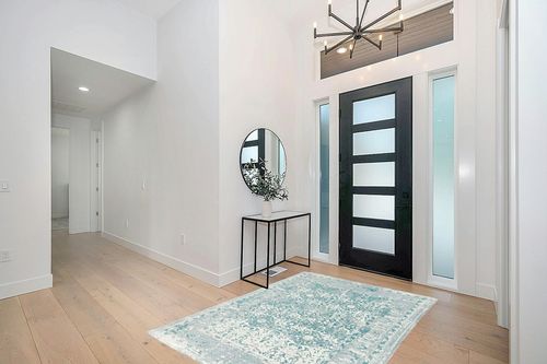 Vintage Jute Area Rug in Modern White Entryway