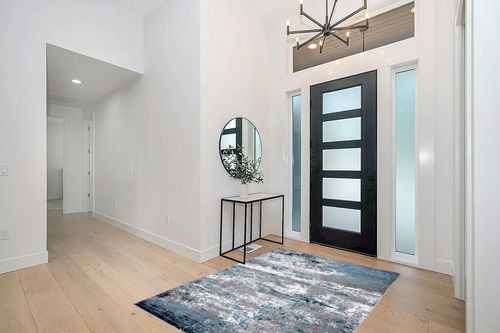 Blue Bohemian Stain Resistant Living Room Area Rug in Modern White Entryway