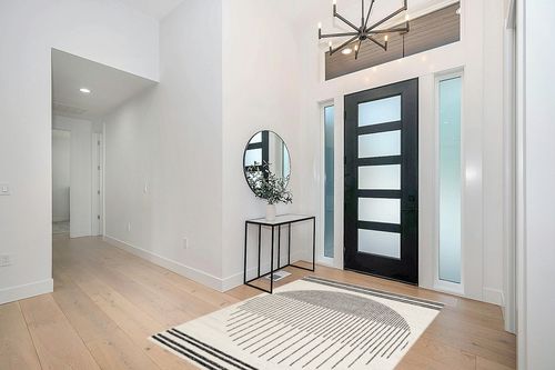 Artistic Weavers Jimina Black/Ivory 5 ft. x 7 ft. Indoor Area Rug in Modern White Entryway