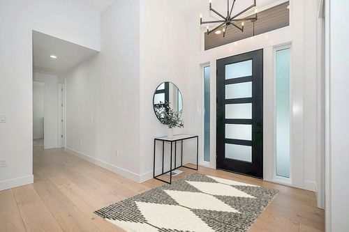 Dave Geometric Ivory/Black Area Rug Steelside Rug Size: Rectangle 5'3" x 7' in Modern White Entryway